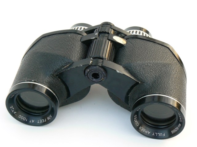 Binoculars on a white background.